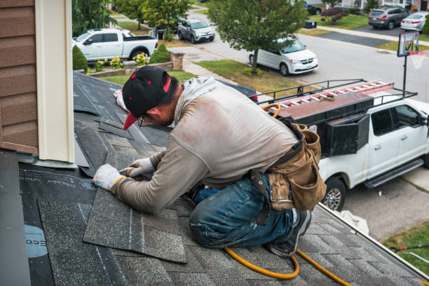 Professional Roof Replacement technician working in Amsterdam, OH